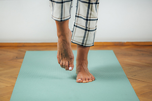 person standing on one foot