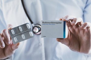 doctor holding drug