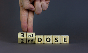 covid third dose booster