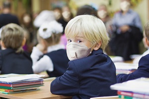 child boy student in protective mask