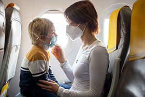 mother and child on plane