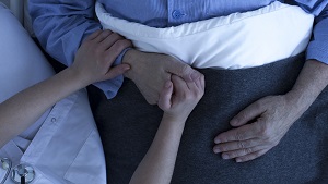 nurse holding hand