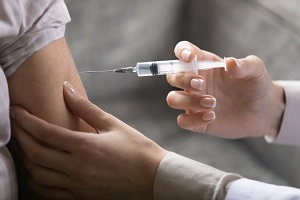  nurse holding syringe