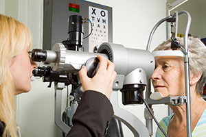 woman getting eye exam