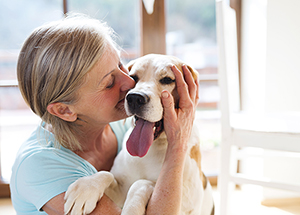 older woman with dog