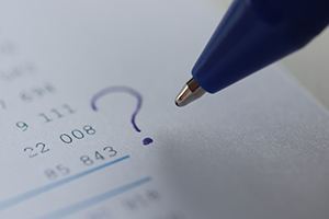 pen writing on numbers