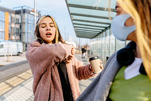 woman about to sneeze