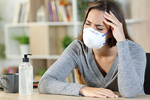 woman at home looking sick small