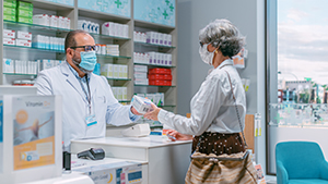 woman at pharmacy counter